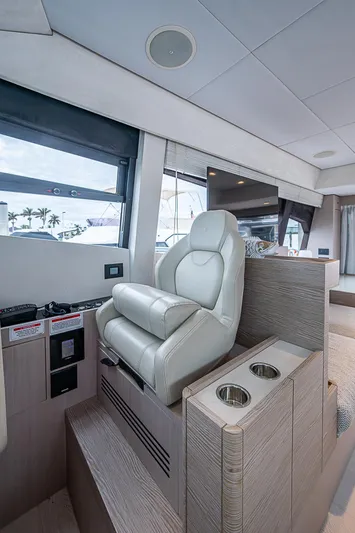 Time Chaser Yacht Photos Pics Luxurious interior of 2021 Ferretti Yachts 500 with plush seating and modern design.