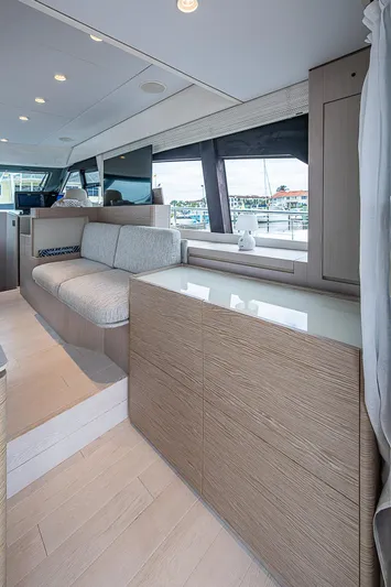 Time Chaser Yacht Photos Pics Luxurious interior of 2021 Ferretti Yachts 500, featuring modern design and spacious seating.