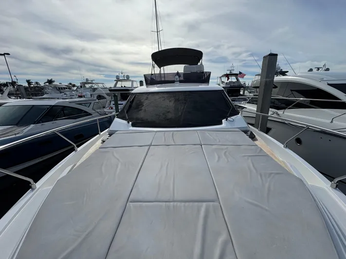 Time Chaser Yacht Photos Pics 2021 Ferretti Yachts 500 docked, showcasing sleek design and spacious deck.