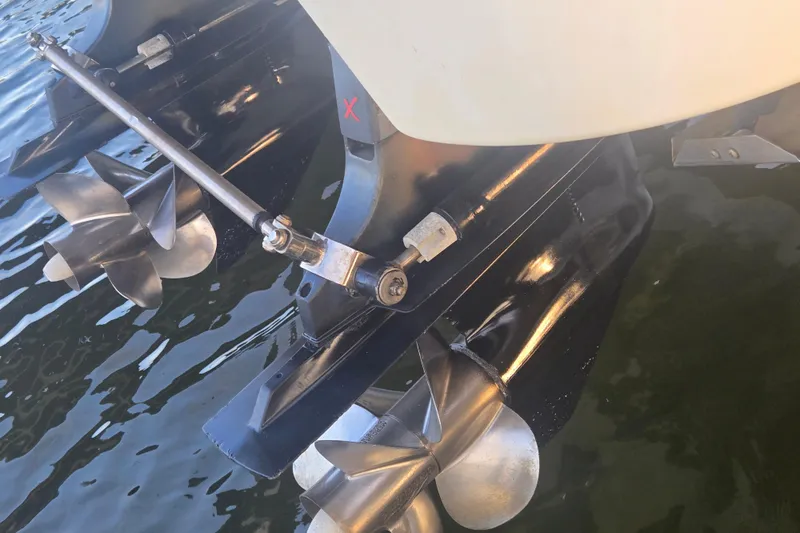 Fly Me Yacht Photos Pics Propellers of a 2013 Formula 310 Sun Sport boat in water.
