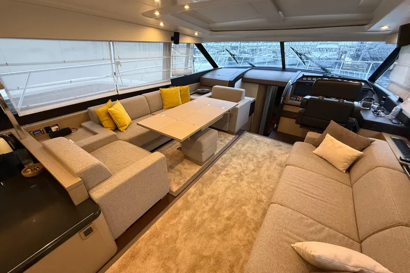  Yacht Photos Pics Luxurious interior of a 2016 Prestige 620S yacht with plush seating and modern design.