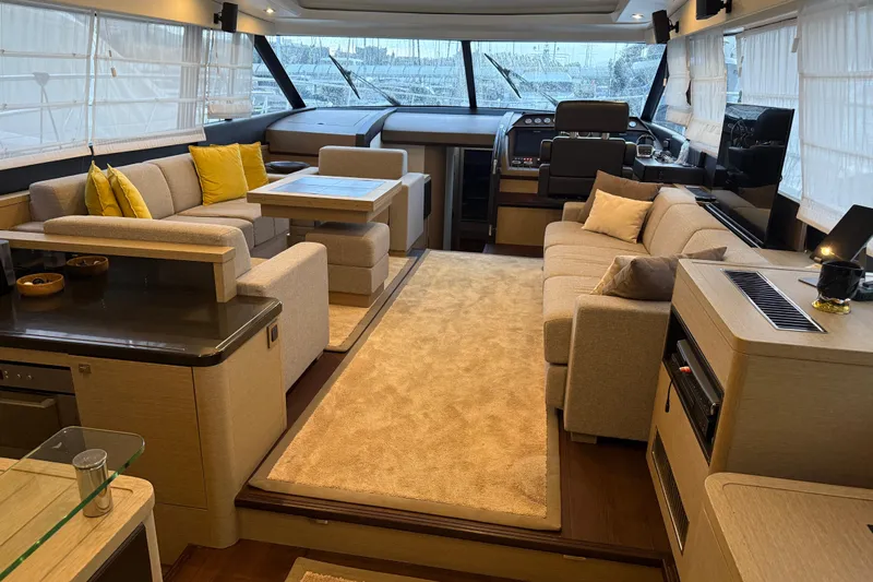  Yacht Photos Pics Luxurious interior of a 2016 Prestige 620S yacht with elegant seating and modern design.