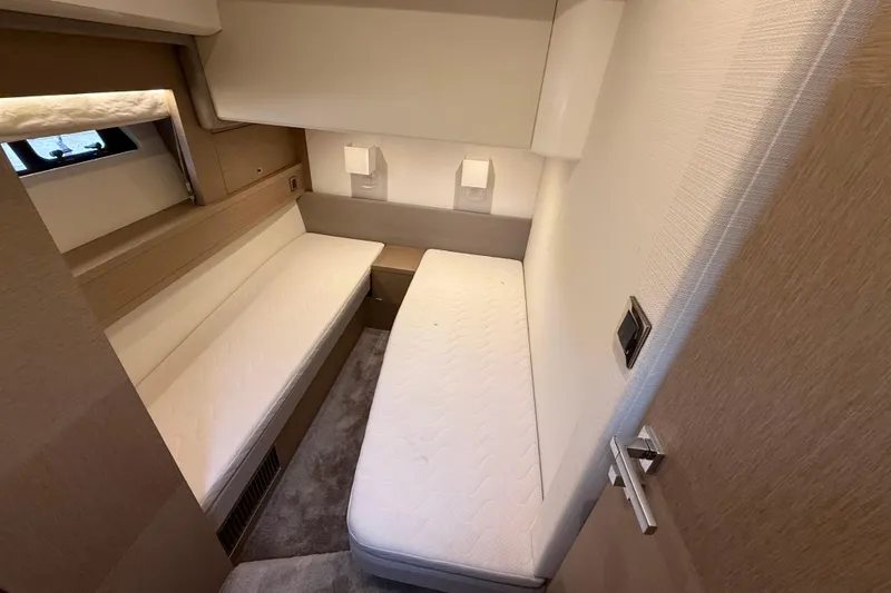  Yacht Photos Pics Interior cabin of 2016 Prestige 620S yacht with twin beds and modern design.