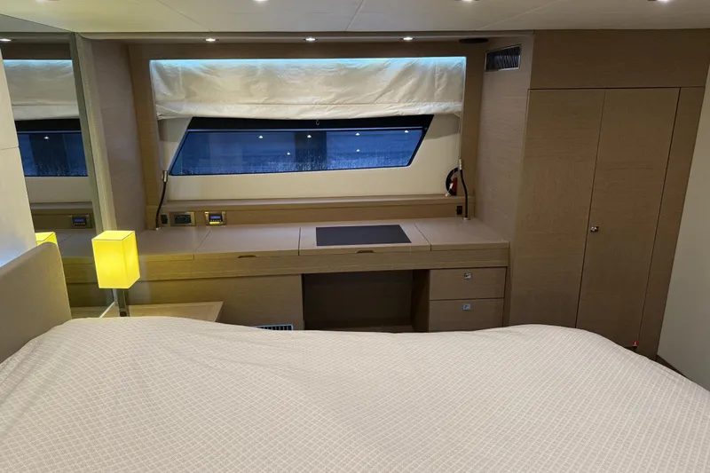  Yacht Photos Pics Luxurious interior of 2016 Prestige 620S yacht with modern furnishings and ambient lighting.