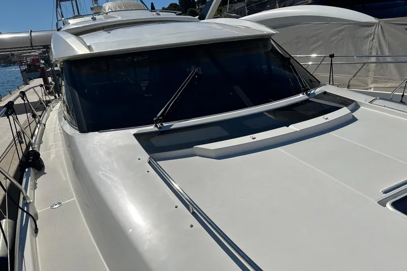  Yacht Photos Pics 2016 Prestige 620S yacht docked, showcasing sleek design and modern features.