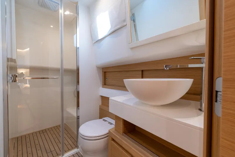 Available Now Yacht Photos Pics Modern bathroom in 2025 Pardo Yachts 50, featuring sleek design and wooden accents.