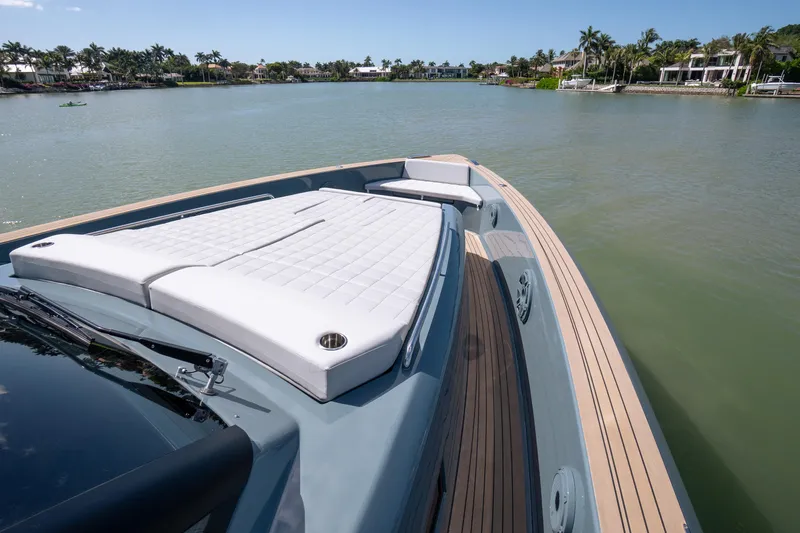 Available Now Yacht Photos Pics 2025 Pardo Yachts 50 with sleek deck design and luxurious sunbed on calm waters.