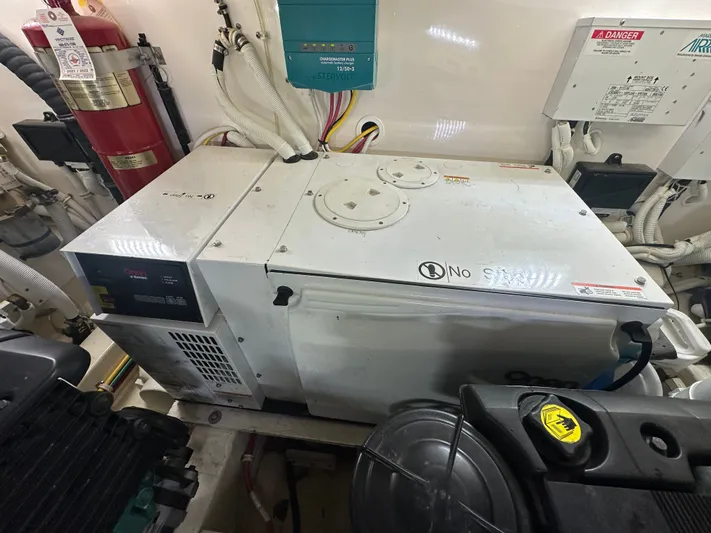 Scoutabout Yacht Photos Pics Engine room of a 2007 Tiara Yachts Sovran with generator.