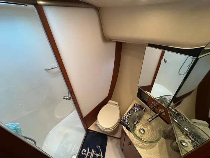 Scoutabout Yacht Photos Pics 2007 Tiara Yachts Sovran bathroom with glass sink.