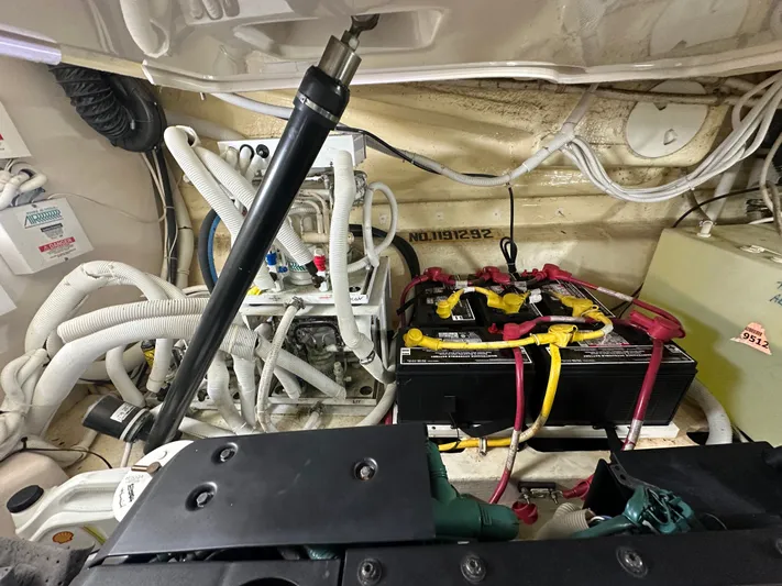 Scoutabout Yacht Photos Pics Engine room of 2007 Tiara Yachts Sovran with batteries and cables.