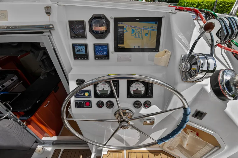 Papillon Yacht Photos Pics Cockpit of 2012 Leopard 39 yacht with navigation instruments and steering wheel.