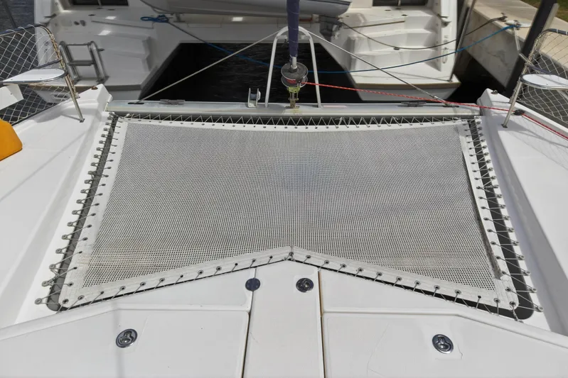 Papillon Yacht Photos Pics Trampoline deck of a 2012 Leopard 39 catamaran, featuring sturdy netting and sleek design.