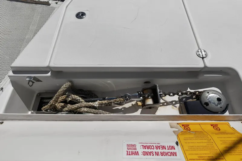 Papillon Yacht Photos Pics Anchor compartment of a 2012 Leopard 39 catamaran with ropes and chain.