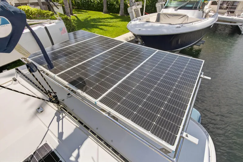 Papillon Yacht Photos Pics Solar panels on a 2012 Leopard 39 yacht docked by the water.