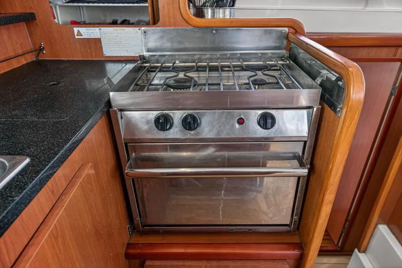 Papillon Yacht Photos Pics Stainless steel stove and oven in 2012 Leopard 39 yacht kitchen.