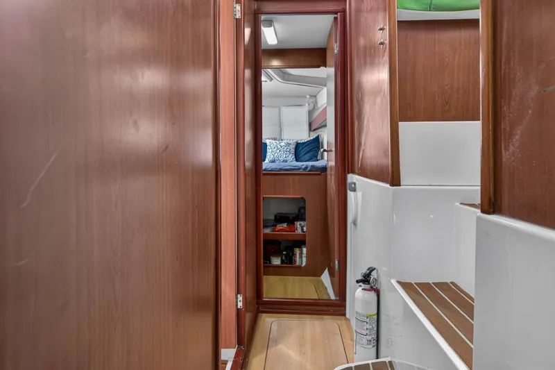 Papillon Yacht Photos Pics Interior of 2012 Leopard 39 yacht, featuring wooden paneling and cozy cabin space.