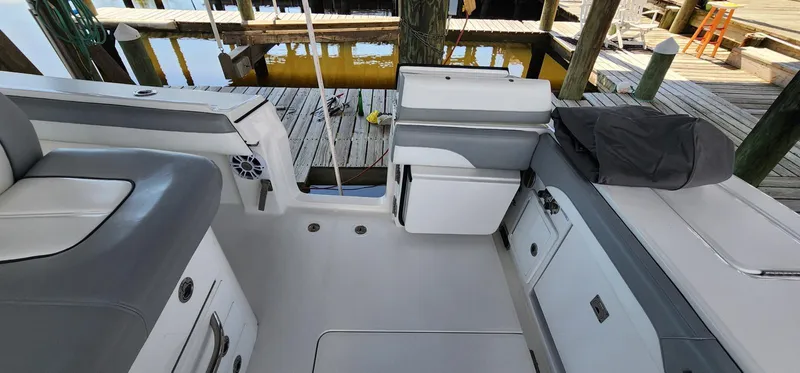  Yacht Photos Pics 2021 Regulator 31 FS boat interior with seating and storage at dock.