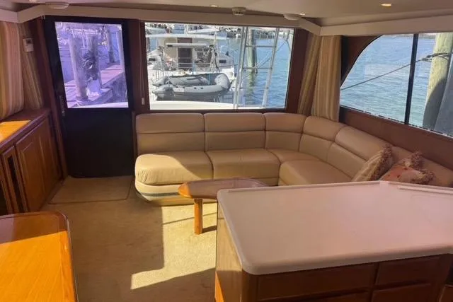  Yacht Photos Pics Luxurious interior of a 1996 Viking 50 Sport Fisher yacht with waterfront view.