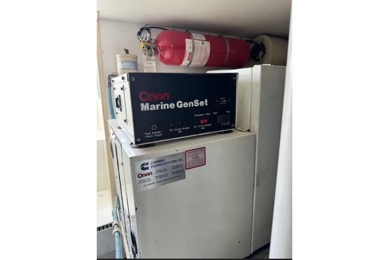  Yacht Photos Pics Onan Marine GenSet in 1996 Viking 50 Sport Fisher, featuring Cummins Power Systems.