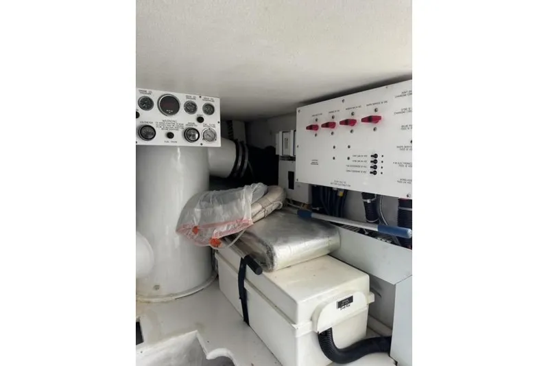  Yacht Photos Pics 1996 Viking 50 Sport Fisher engine room with control panels and equipment.