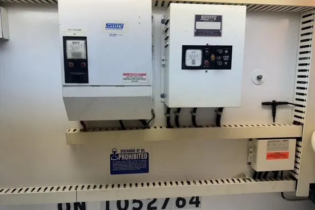  Yacht Photos Pics Electrical panel on a 1996 Viking 50 Sport Fisher Convertible boat.