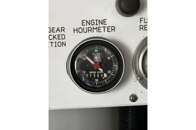  Yacht Photos Pics Engine hour meter on 1996 Viking 50 Sport Fisher, displaying 1564 hours.