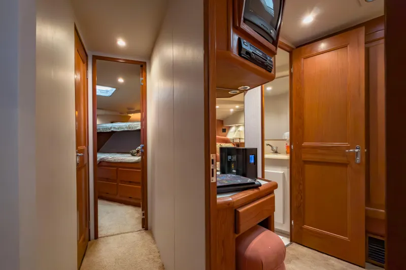  Yacht Photos Pics Interior of 1996 Viking 50 Sport Fisher yacht with wood paneling and cozy cabin.