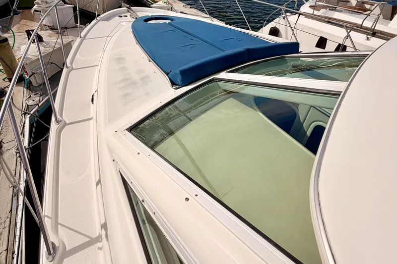 Spirit Of St Louis Yacht Photos Pics 2001 Maxum 4600 SCB Limited Edition yacht deck with blue cover and railing.