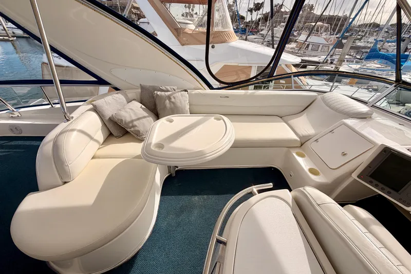 Spirit Of St Louis Yacht Photos Pics Luxurious interior of 2001 Maxum 4600 SCB Limited Edition yacht with plush seating and table.