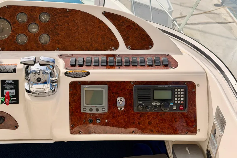Spirit Of St Louis Yacht Photos Pics Control panel of a 2001 Maxum 4600 SCB Limited Edition yacht with navigation instruments.
