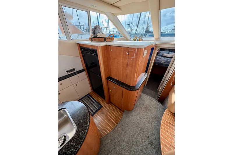 Spirit Of St Louis Yacht Photos Pics Luxurious interior of 2001 Maxum 4600 SCB Limited Edition yacht with modern kitchen amenities.