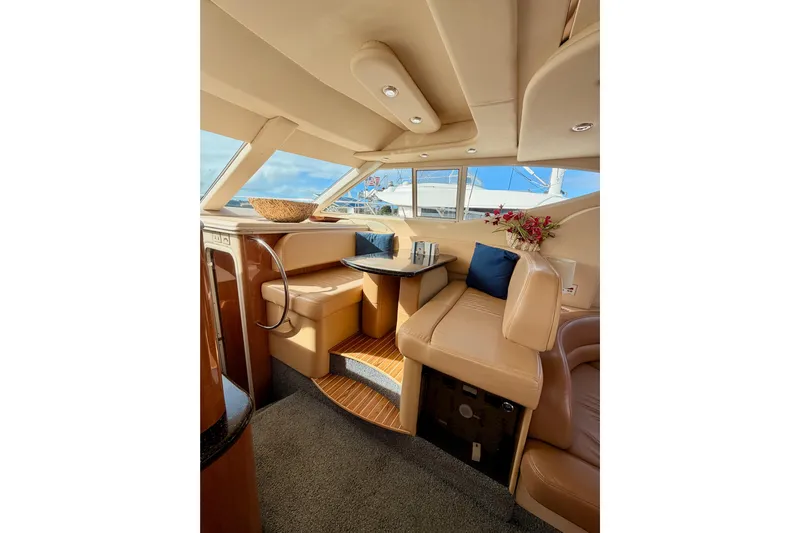 Spirit Of St Louis Yacht Photos Pics Luxurious interior of 2001 Maxum 4600 SCB yacht with leather seating and elegant decor.