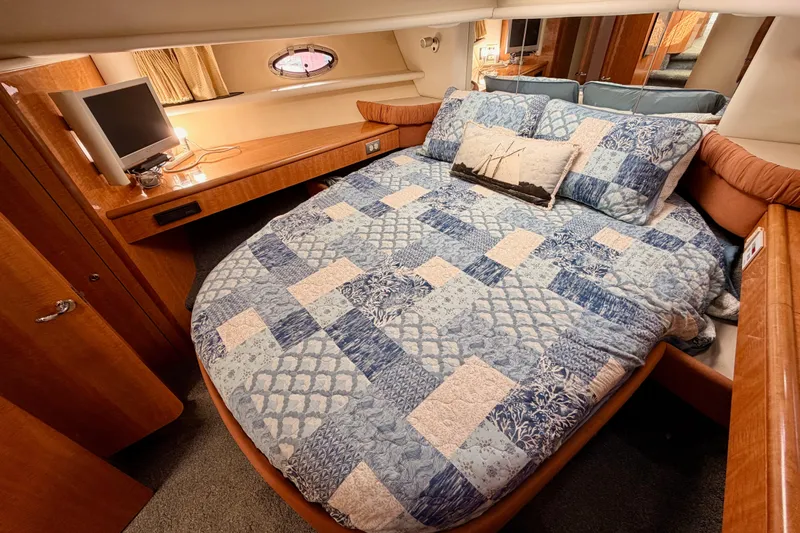 Spirit Of St Louis Yacht Photos Pics Luxurious cabin interior of 2001 Maxum 4600 SCB Limited Edition yacht with cozy bedding.
