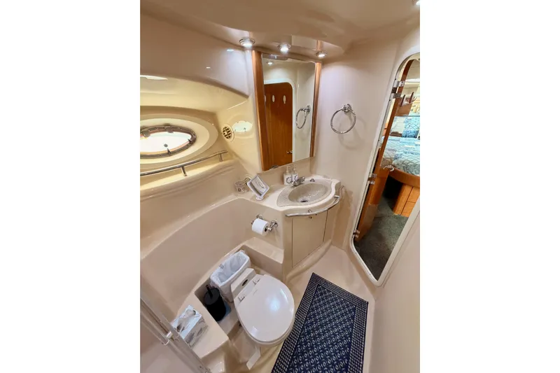 Spirit Of St Louis Yacht Photos Pics Luxurious bathroom in 2001 Maxum 4600 SCB Limited Edition yacht, featuring modern amenities.
