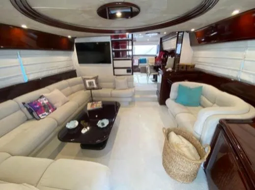  Yacht Photos Pics Luxurious interior of a 2002 Ferretti Yachts 72 with elegant seating and modern decor.