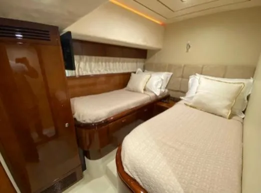  Yacht Photos Pics Luxurious twin cabin in 2002 Ferretti Yachts 72, featuring elegant wood finishes.