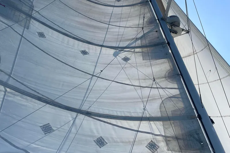 Endless Summer Yacht Photos Pics Sail of 2008 Admiral 40 Executive yacht against clear blue sky.