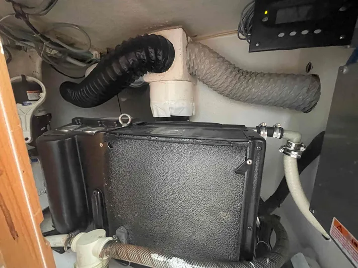 Endless Summer Yacht Photos Pics Engine compartment of a 2008 Admiral Executive with hoses and ventilation system.