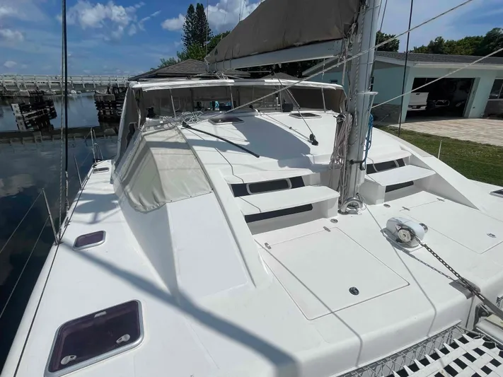 Endless Summer Yacht Photos Pics 2008 Admiral Executive yacht docked, featuring sleek white deck and modern design elements.