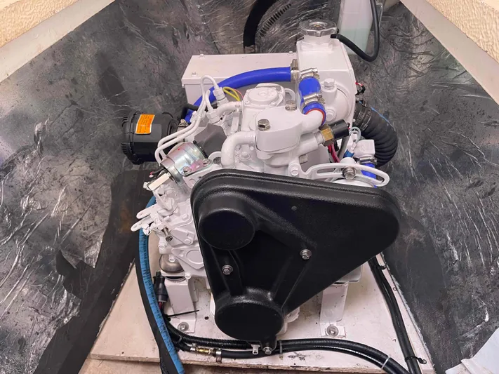 Endless Summer Yacht Photos Pics 2008 Admiral Executive engine in a metallic compartment, featuring hoses and components.