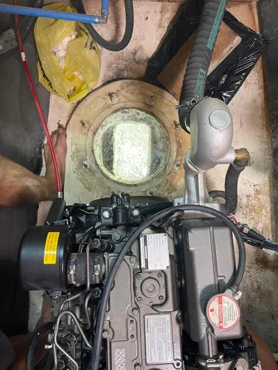 Endless Summer Yacht Photos Pics Engine room of 2008 Admiral Executive boat with visible machinery and porthole.