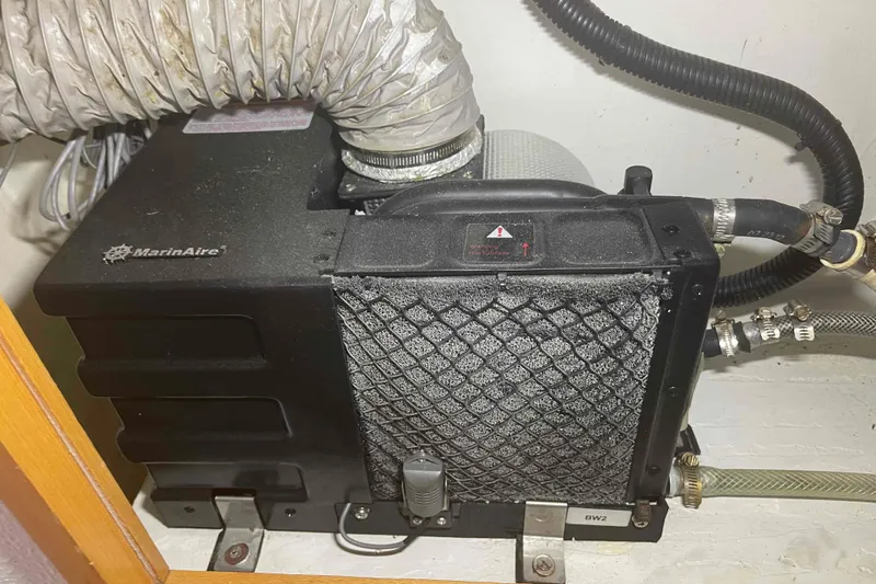 Endless Summer Yacht Photos Pics Marine air conditioning unit in a 2008 Admiral Executive boat, featuring MarinAire system.