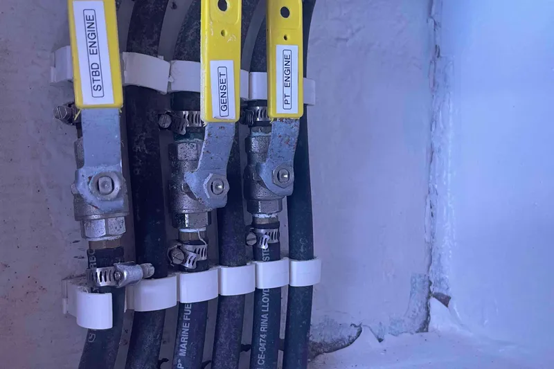 Endless Summer Yacht Photos Pics Fuel line valves labeled for engines and generator on a 2008 Admiral Executive.