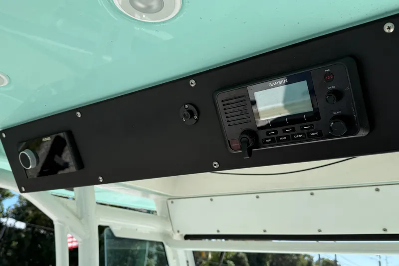 Stunning Seafoam Green Yacht Photos Pics 2022 Everglades 273 Center Console with Garmin marine electronics display.