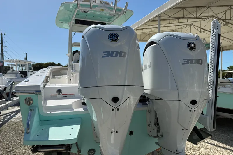 Stunning Seafoam Green Yacht Photos Pics 2022 Everglades 273 Center Console boat with dual Yamaha 300 engines.