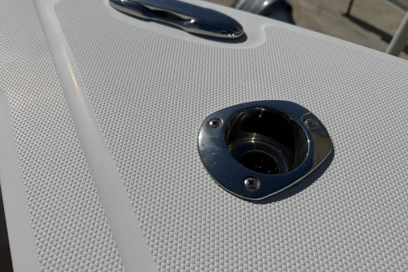 Stunning Seafoam Green Yacht Photos Pics Close-up of Everglades 273 Center Console 2022 boat deck with metal fitting.