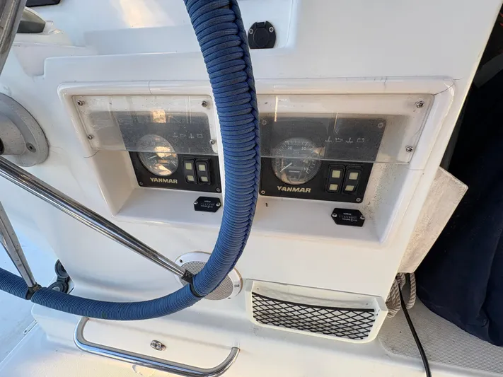 Chasing Summer Yacht Photos Pics Control panel of a 2012 Lagoon 400 catamaran with Yanmar engine displays.