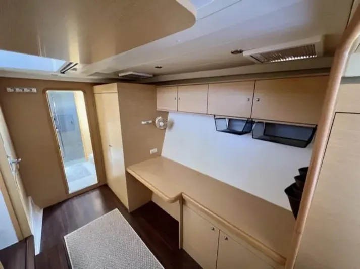 Chasing Summer Yacht Photos Pics Interior of 2012 Lagoon 400 yacht with wooden cabinetry and modern design.
