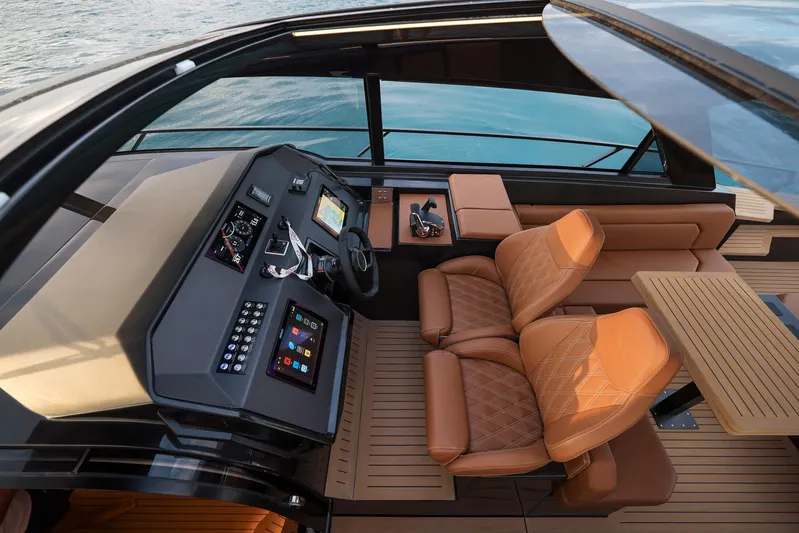  Yacht Photos Pics Luxurious 2025 Focus 3X yacht interior with leather seats and advanced navigation controls.
