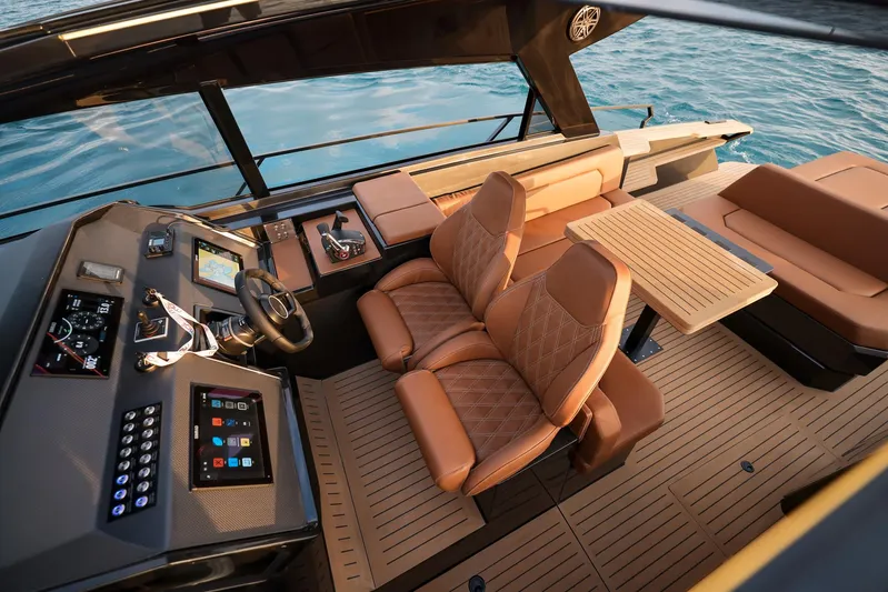  Yacht Photos Pics Luxurious 2025 Focus 3X yacht interior with leather seating and advanced navigation controls.